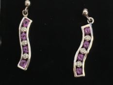 (925)diamond and amethyst wavey style Earrings