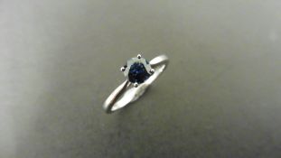 0.50ct solitaire style ring set with a round cut sapphire (treated) 5mm.