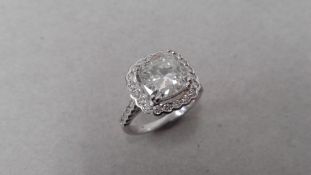 3.67ct diamond set ring set in 18ct white gold. Cushion cut diamond, I colour and I1 clarity.Fancy