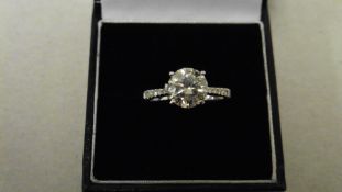 2ct diamond set solitaire ring set in 18ct gold. Brilliant cut diamond H colour and I1 clarity. 4