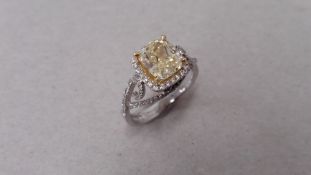 2.11ct diamond set solitaire ring. Yellow cushion cut diamond,Fancy yellow, VVS2 clarity on GIA