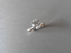 1.73ct diamond solitaire ring set in platinum. Enhanced diamond, H colour and I2 clarity.