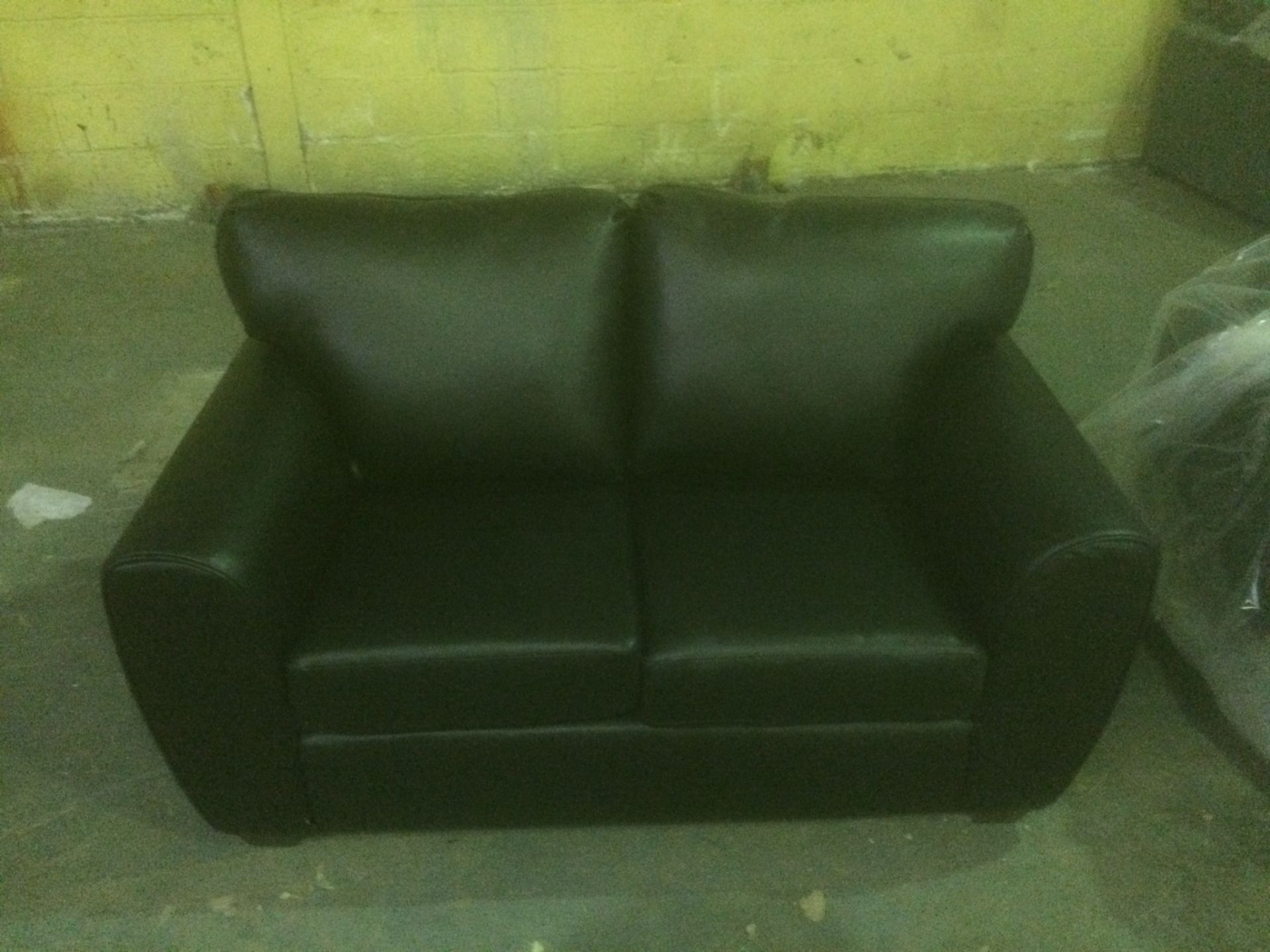 Parker 3 seater plus 2 seater black leather sofas with contrasting dark oak wooden feet