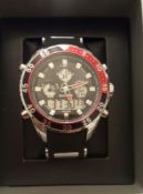 BRAND NEW QUAMER GENTS MULTI FUNCTIONAL DIGITAL WATCH, BLACK AND RED BEZEL AND BLACK FACE,
