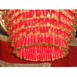 Artist: James Day - Red shotgun cartridge chandelier.