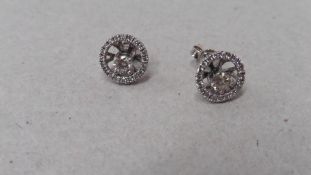 Diamond stud earrings. Solitaire style studs, 0.30ct total weight set in 9ct white gold. I colour,