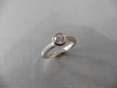 18ct white gold diamond set solitaire ring with a Brilliant cut diamond weighing 0.41ct secured in a