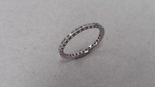 0.26ct diamod set band ring. Brilliant cut diamonds set all the way round in a micro claw setting. H