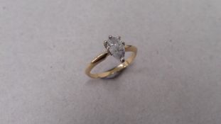 14ct gold diamond solitaire ring set with a pear shaped diamond J colour, I1 clarity. 6 claw setting