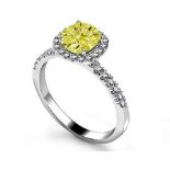 A Cushion Cut Yellow Diamond Halo Ring