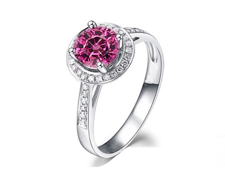 A Brand New Diamond And Rhodolite Halo Ring