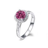 A Brand New Diamond And Rhodolite Halo Ring