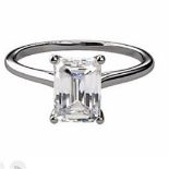 A New Emerald cut 4 claw Ring