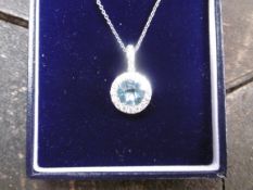 Very Pretty Topaz and Diamond pendant
