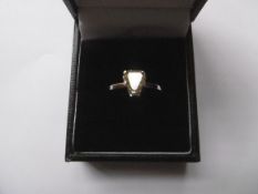 Fancy pale yellow diamond ring