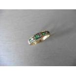 Emerald and diamond eternity style ring. Set with 4 round cut emeralds ( treated )0.40ct and 3