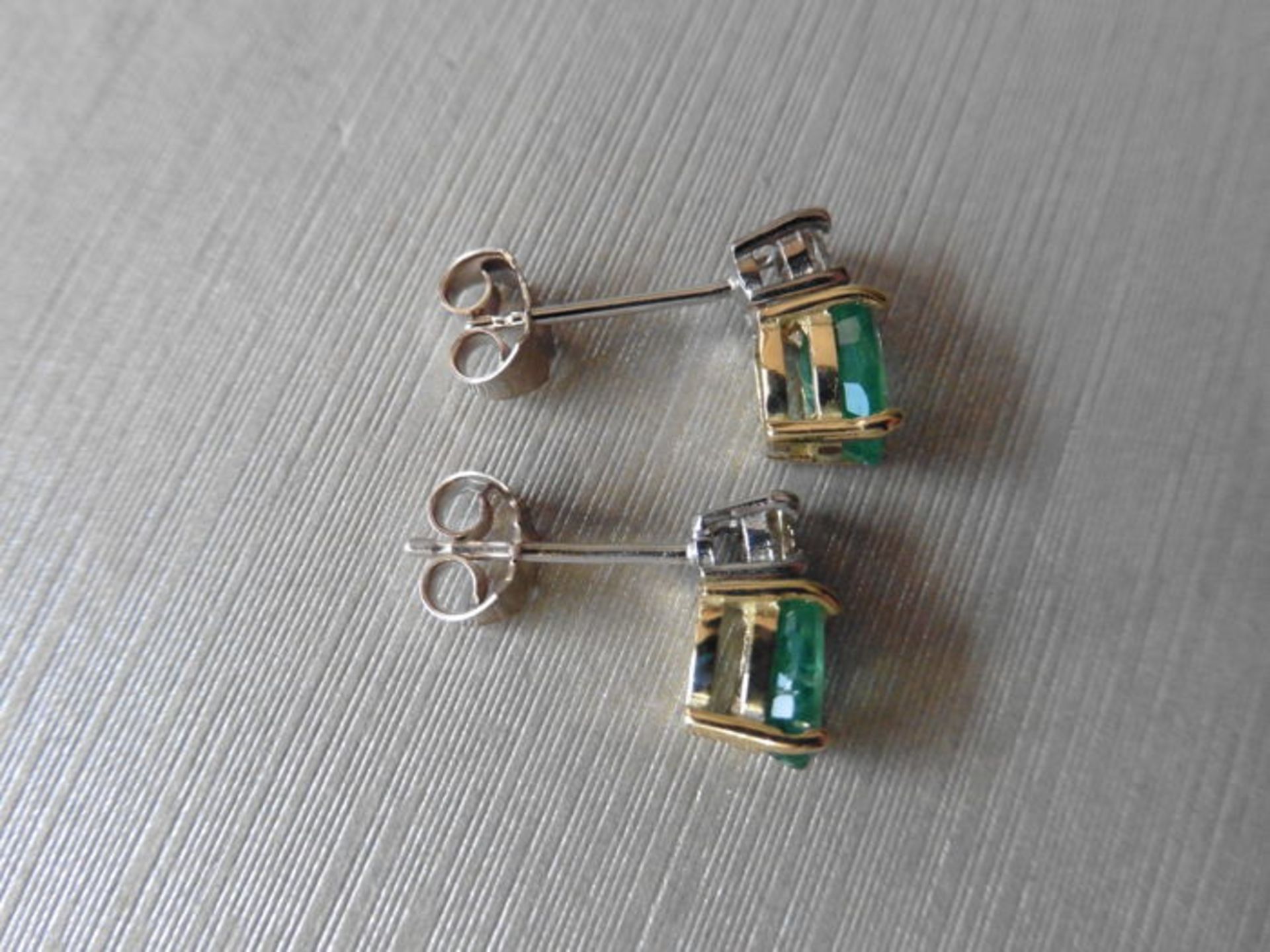 Emerald and Diamond drop earrings. Each set with a 7 x 5mm oval cut emerald ( treated), 1.60ct - Image 3 of 3