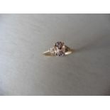 0.80ct / 0.09ct morganite and diamond dress ring. Oval cut morganite in the centre with 3 small