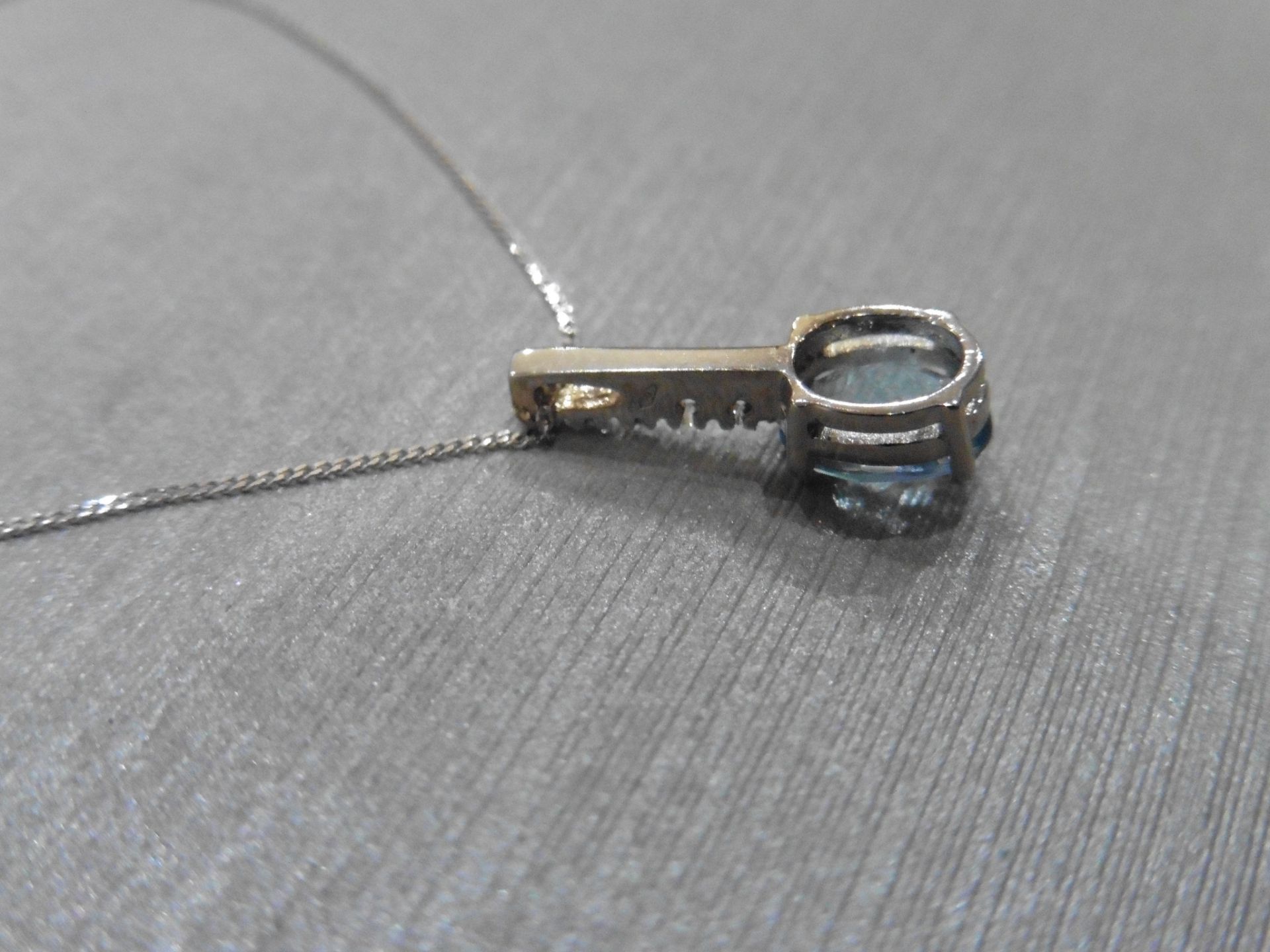 0.80ct Aqua marine and diamond drop style pendant. 7X 5mm oval aqua set with 5 small brilliant cut - Image 3 of 3