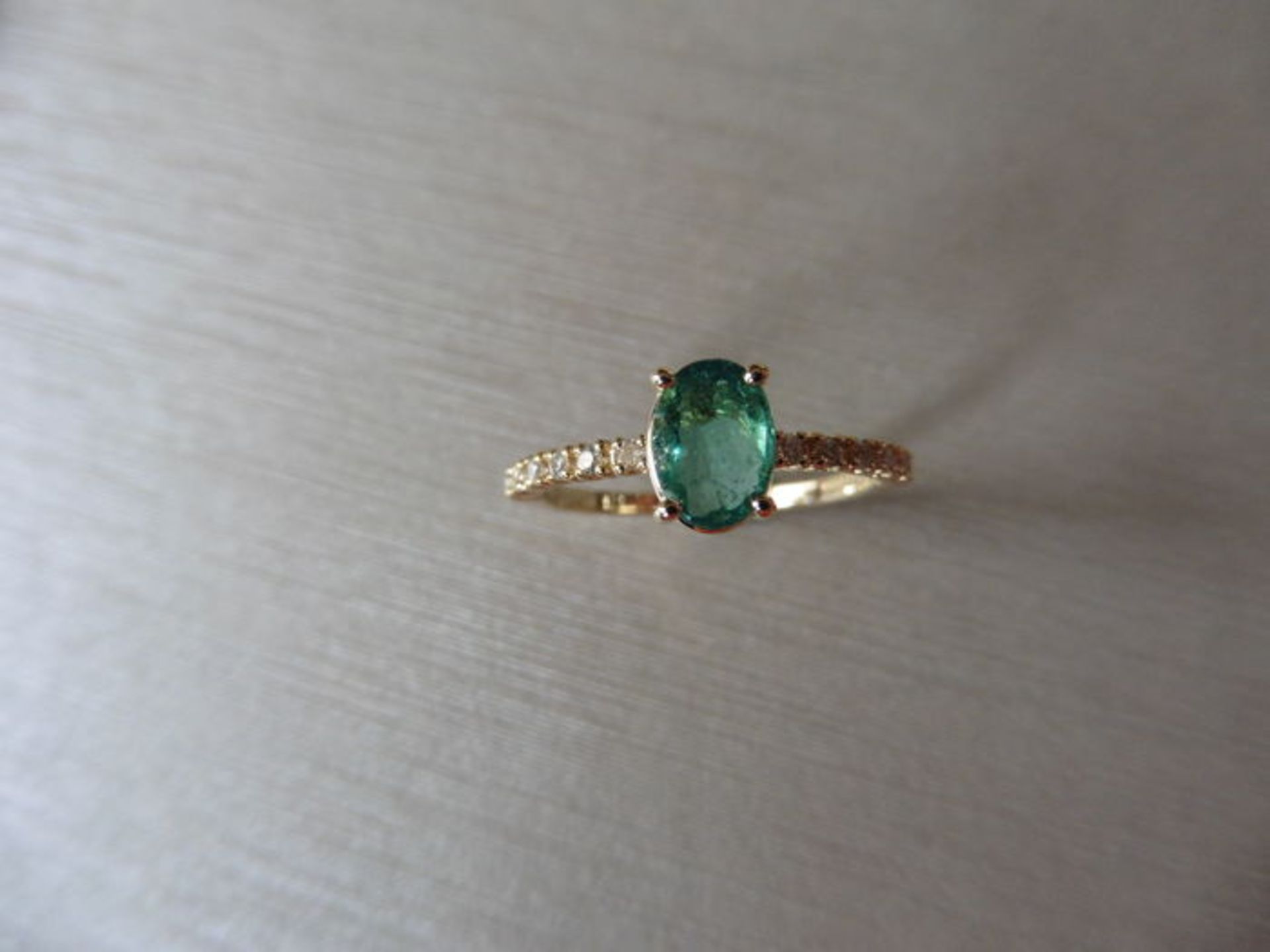 0.80ct / 0.12ct Emerald and diamond dress ring. Oval cut ( oil treated) emerald with small - Image 3 of 3