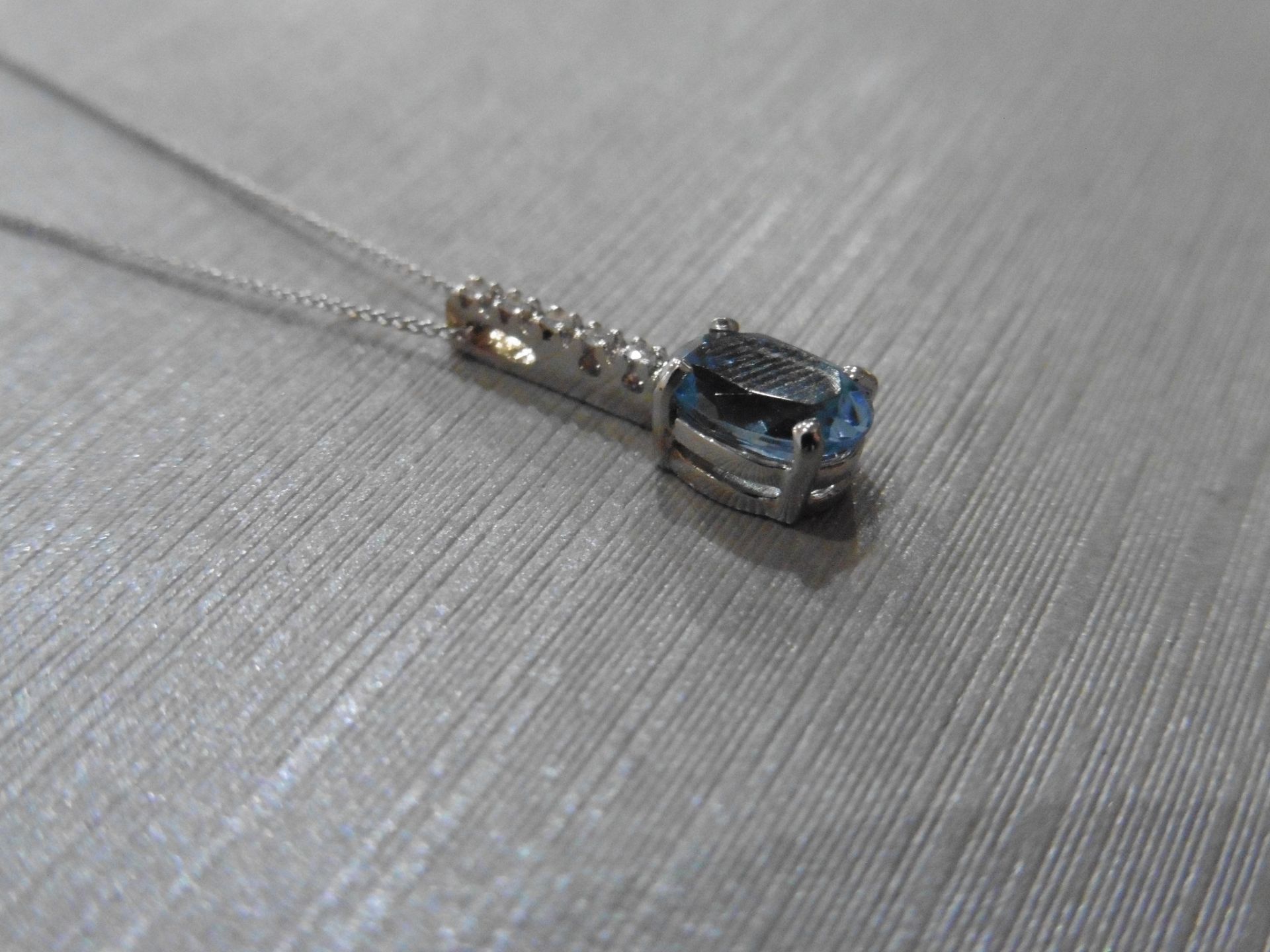 0.80ct Aqua marine and diamond drop style pendant. 7X 5mm oval aqua set with 5 small brilliant cut - Image 2 of 3