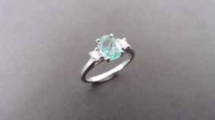 0.80ct emerald and diamond trilogy ring. 7x 5mm oval cut emerald ( oil treated) with a small diamond
