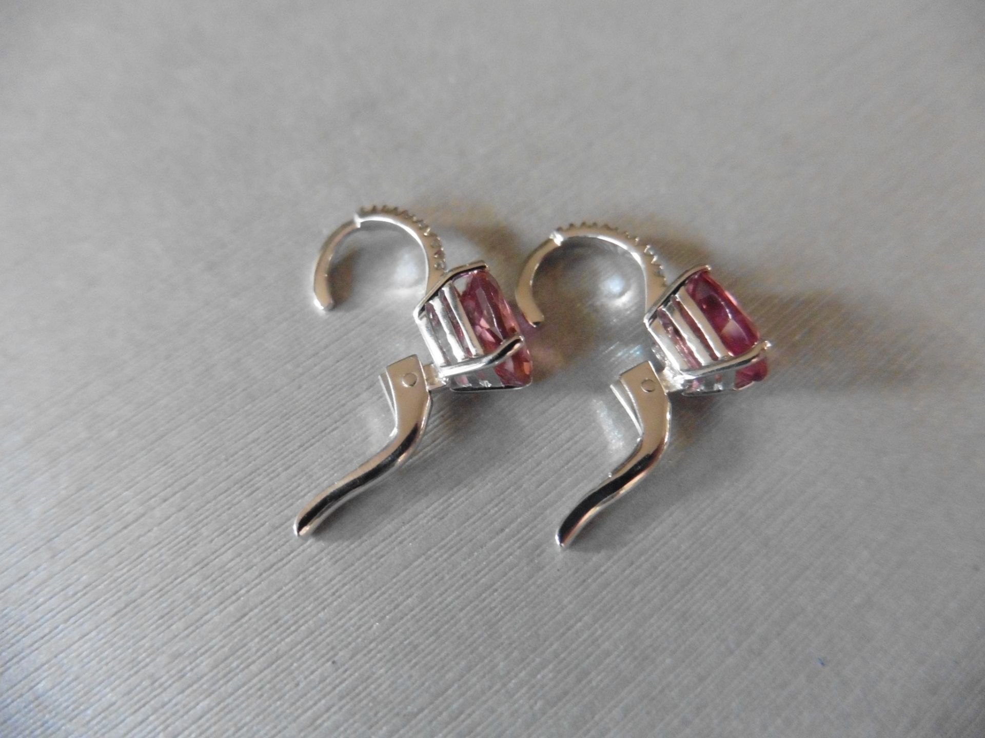 1.60ct Pink Tourmaline and diamond hoop style earrings. Each is set with a 7x 5mm oval cut - Image 3 of 3