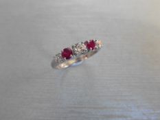 0.75ct ruby and diamond five stone ringset in 18ct gold. 2 rubies( treated ) 3 brilliant cut