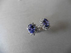 1.60ct Tanzanite and Diamond cluster style stud earrings. Each Tanzanite( treated ) measures 7mm x