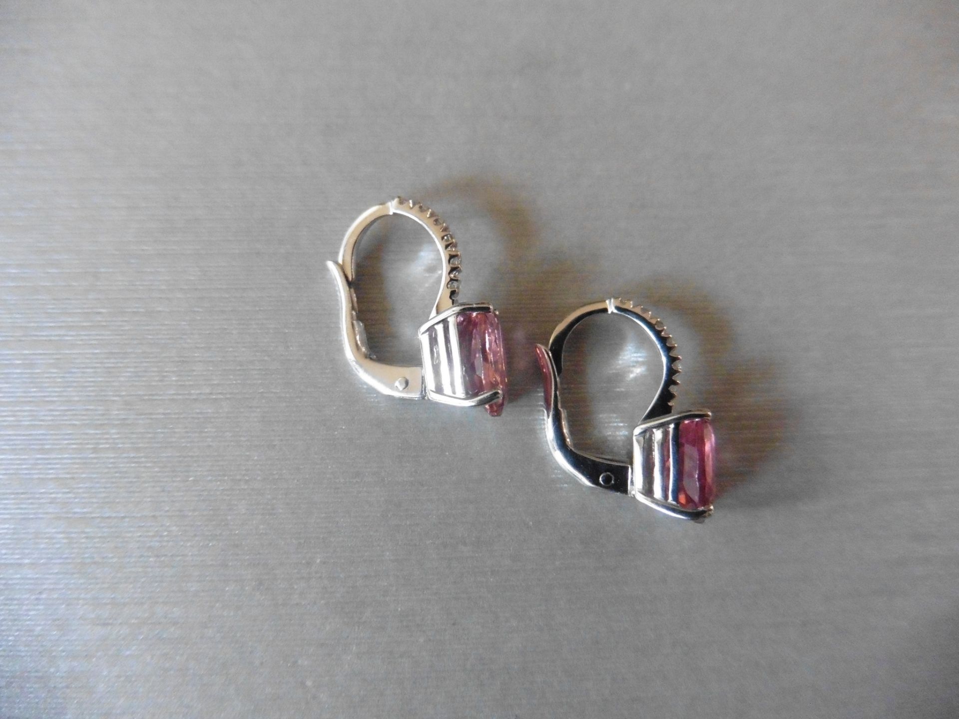 1.60ct Pink Tourmaline and diamond hoop style earrings. Each is set with a 7x 5mm oval cut - Image 2 of 3