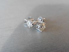 2.00ct Diamond solitaire earrings set with brilliant cut diamonds, H colour I1 clarity. Four claw
