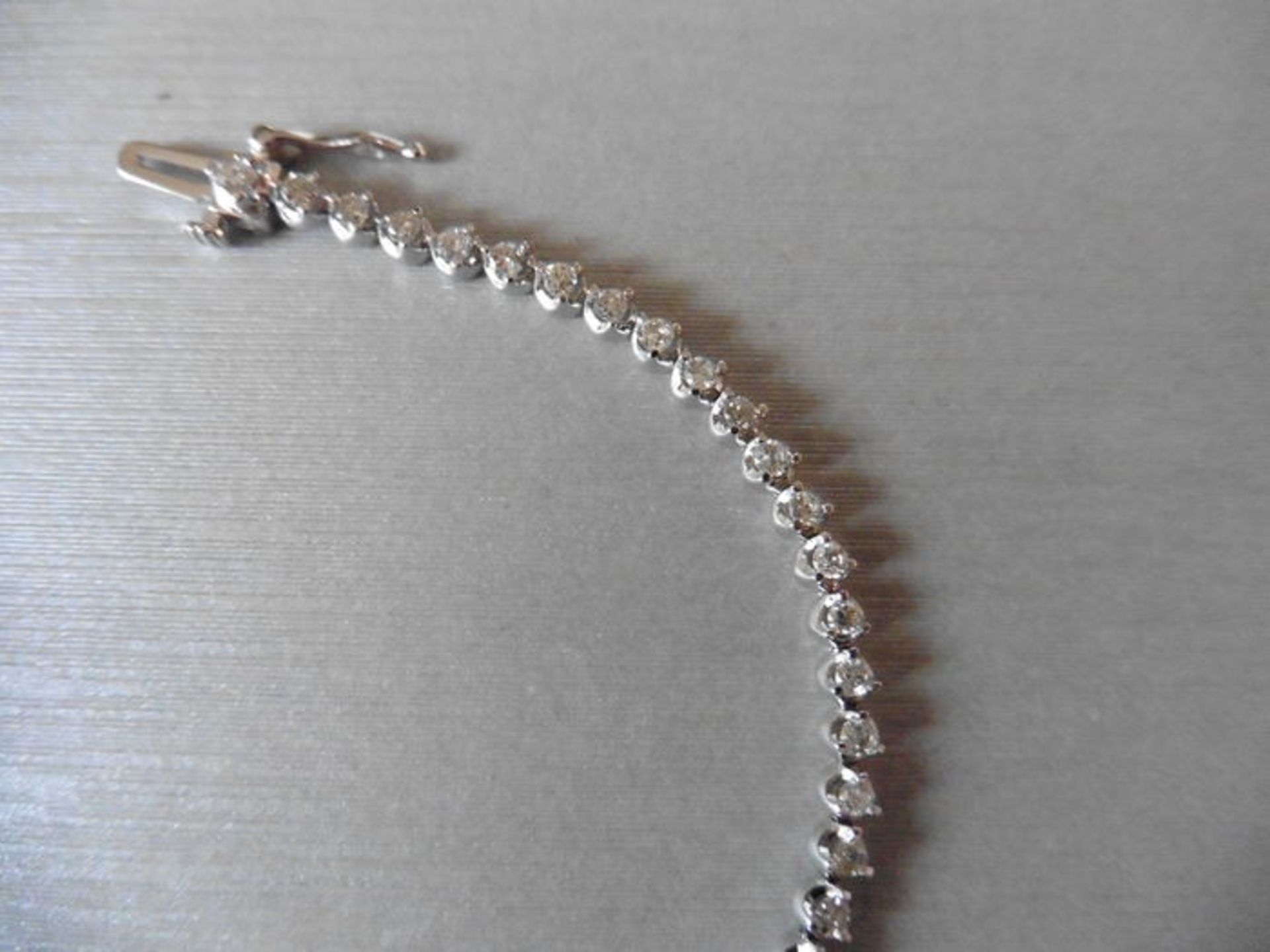 2.10ct diamond tennis bracelet with 70 brilliant cut diamonds, H/I colour and Si2 clarity, - Image 3 of 3