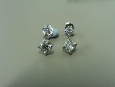 1.02ct diamond drop earrings. 2 brilliant cut diamonds at the bottom, 0.40ct each, I colour, si3