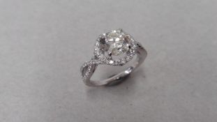 2.40ct diamond set solitaire ring. Brilliant cut diamond, J colour, si1 clarity. Halo setting with