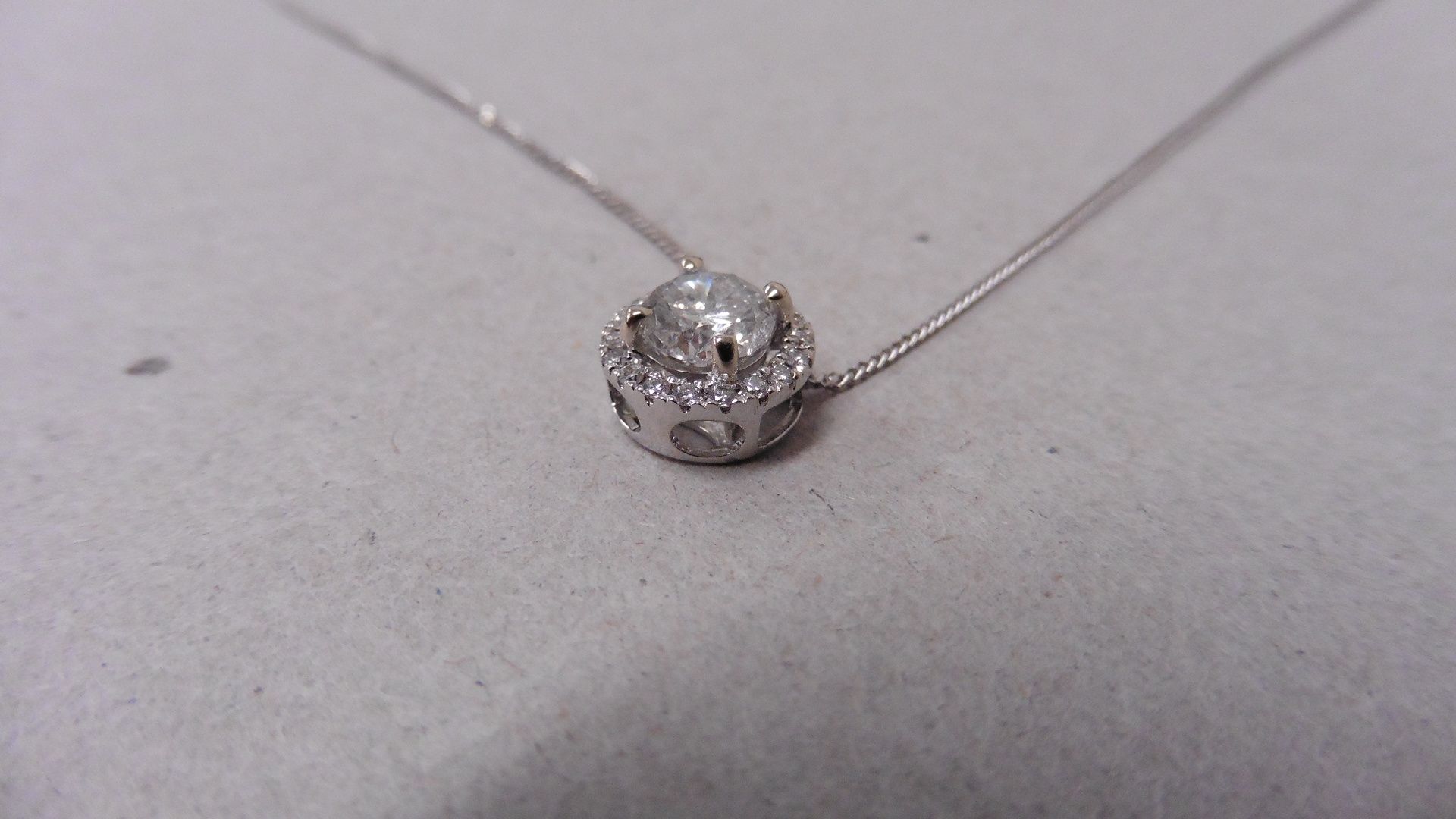 0.70ct diamond set pendant. Brilliant cut diamond I-J colour, si2-I1 clarity. Halo setting with - Image 3 of 4