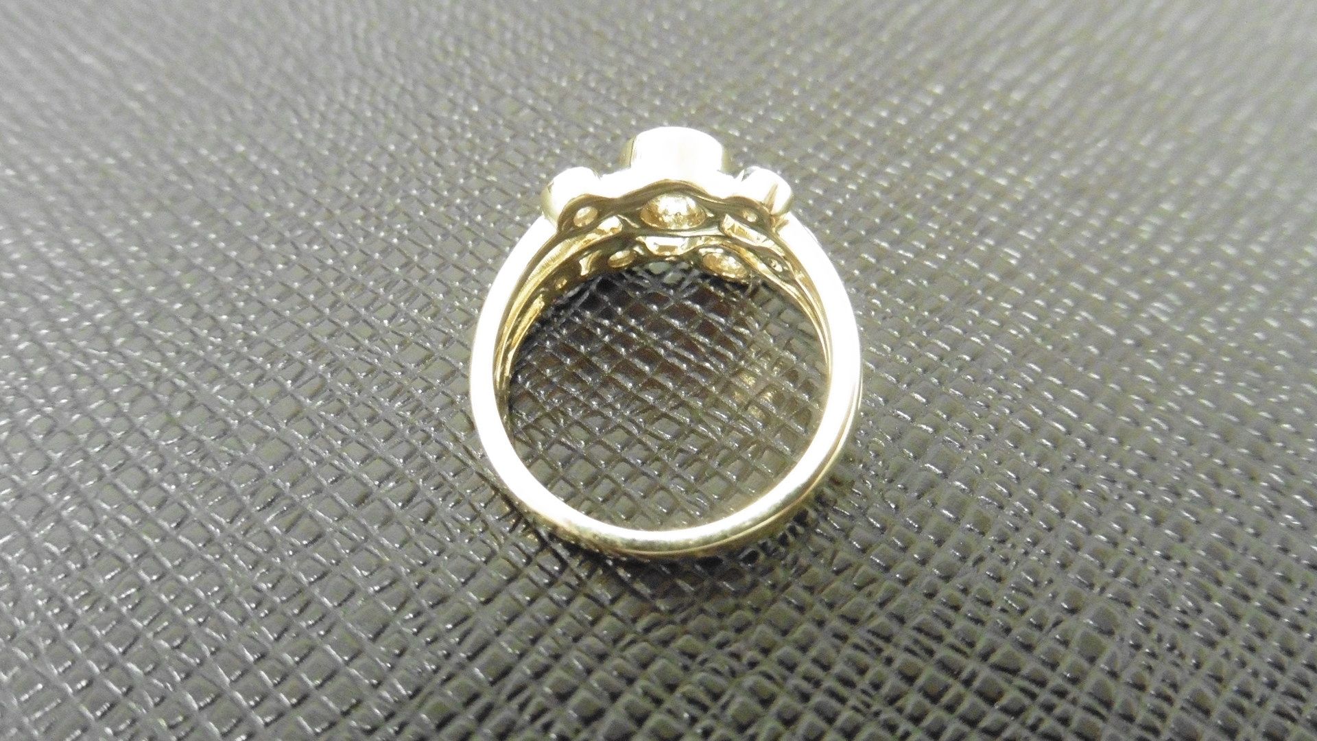1.00ct 9ct yellow gold diamond dress ring, rain dance style. Set with 7 graduated brilliant cut - Image 3 of 4