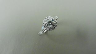 0.40ct diamond set solitaire ring set in 18ct gold. Centre stone J colour, si3 clarity with a halo