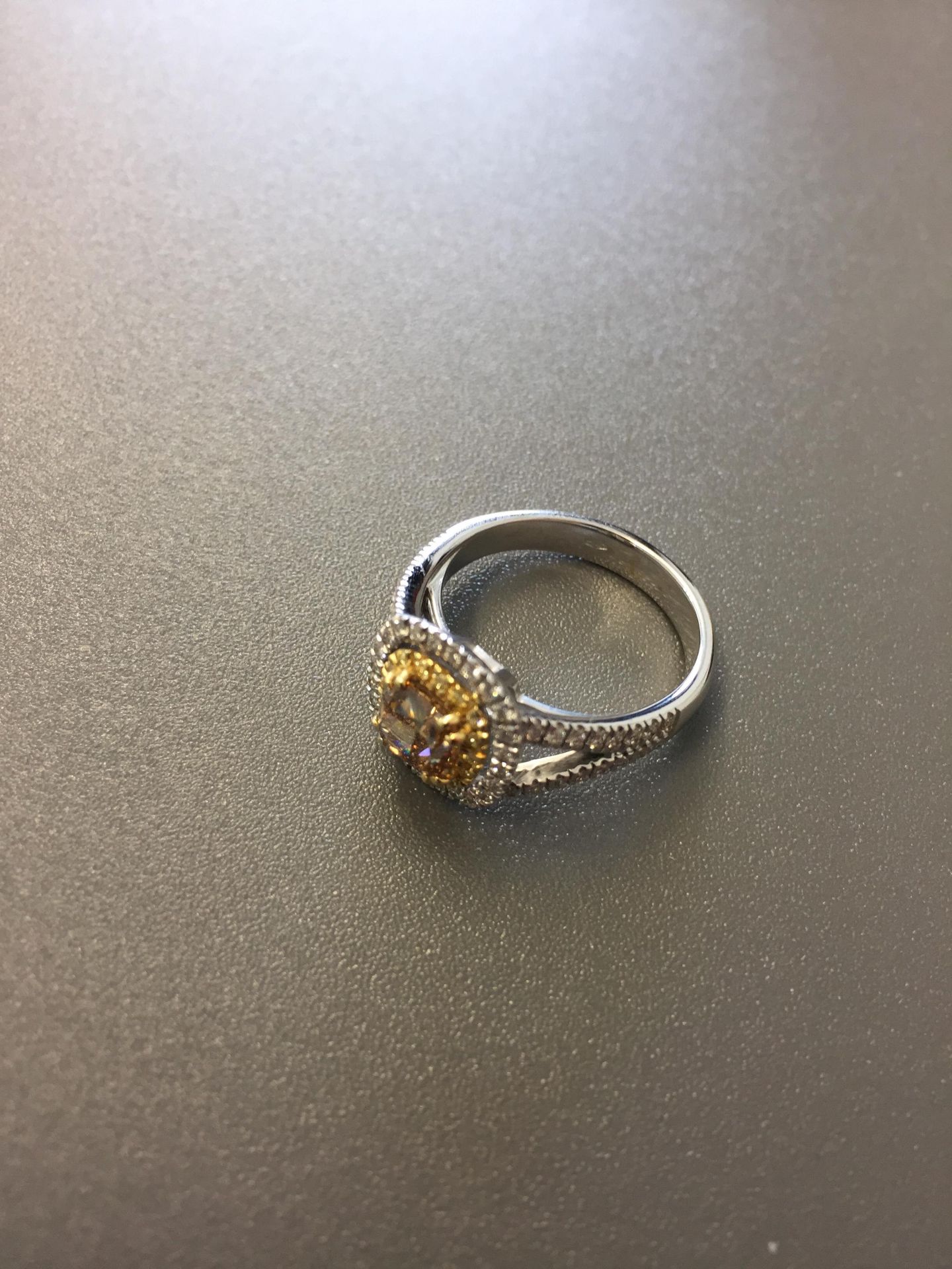 1.15ct diamond set solitaire ring with a yellow cushion cut yellow diamond and a halo setting and - Image 3 of 5