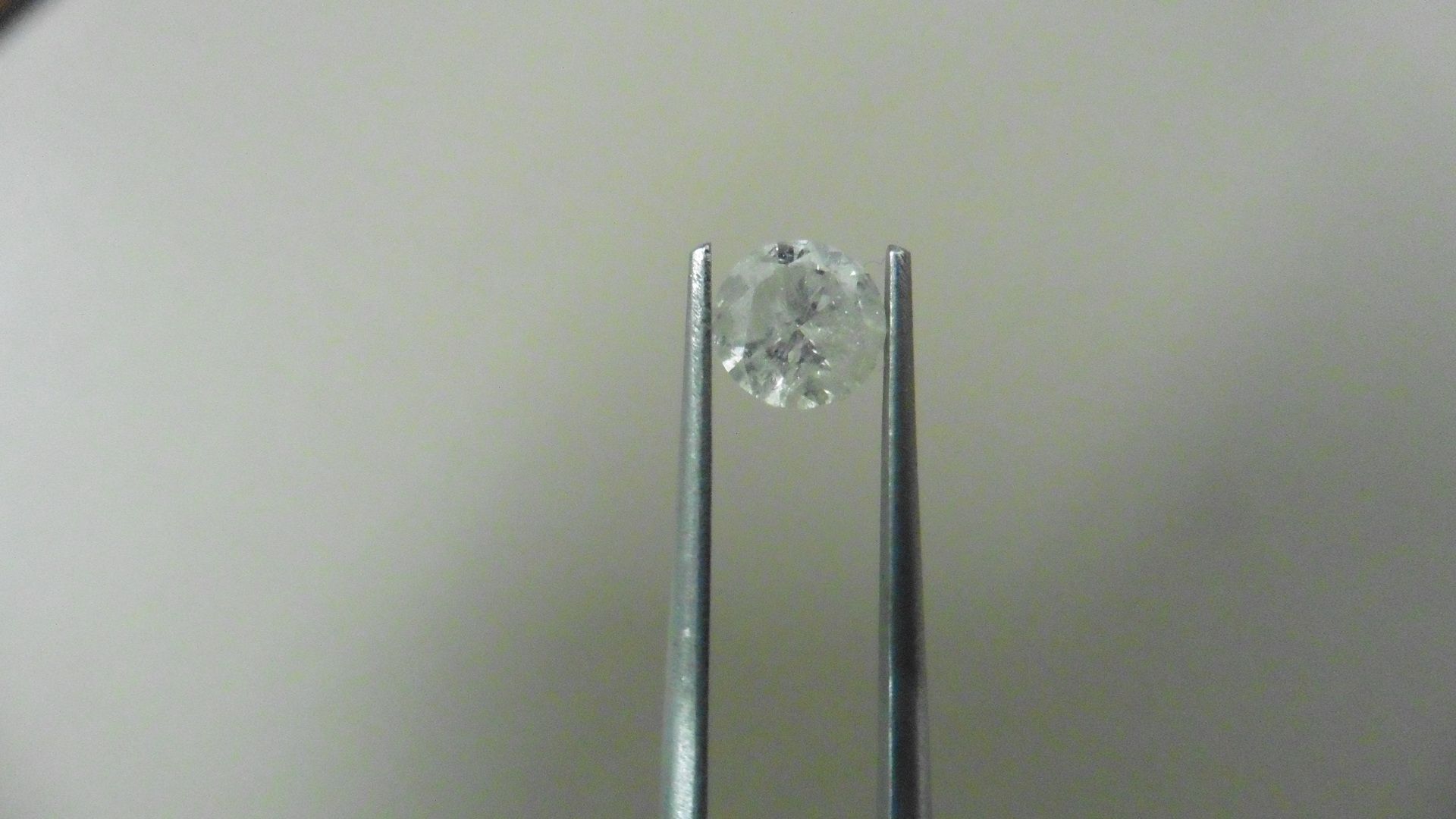 1.02ct Brilliant Cut Diamond, Enhanced stone. H colour, I2 clarity. 6.27 x 4mm. Valued at £1490