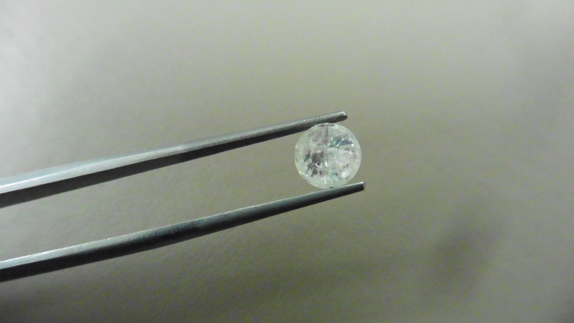 1.02ct Brilliant Cut Diamond, Enhanced stone. H colour, I2 clarity. 6.27 x 4mm. Valued at £1490 - Image 3 of 4