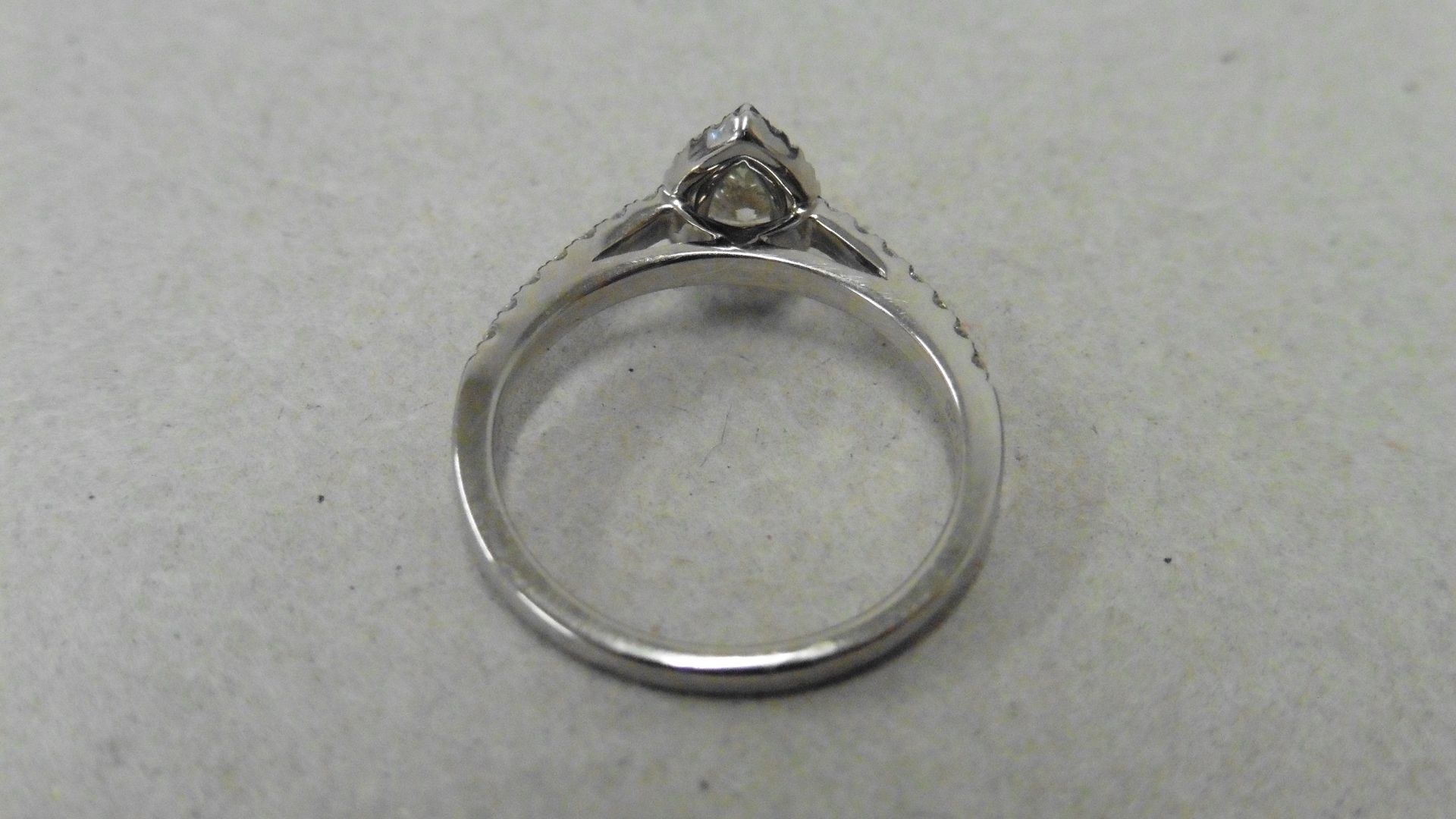 18ct gold diamond set solitaire ring. 0.43ct pear shaped diamond, H colour and VS2 clarity. Halo - Image 6 of 7