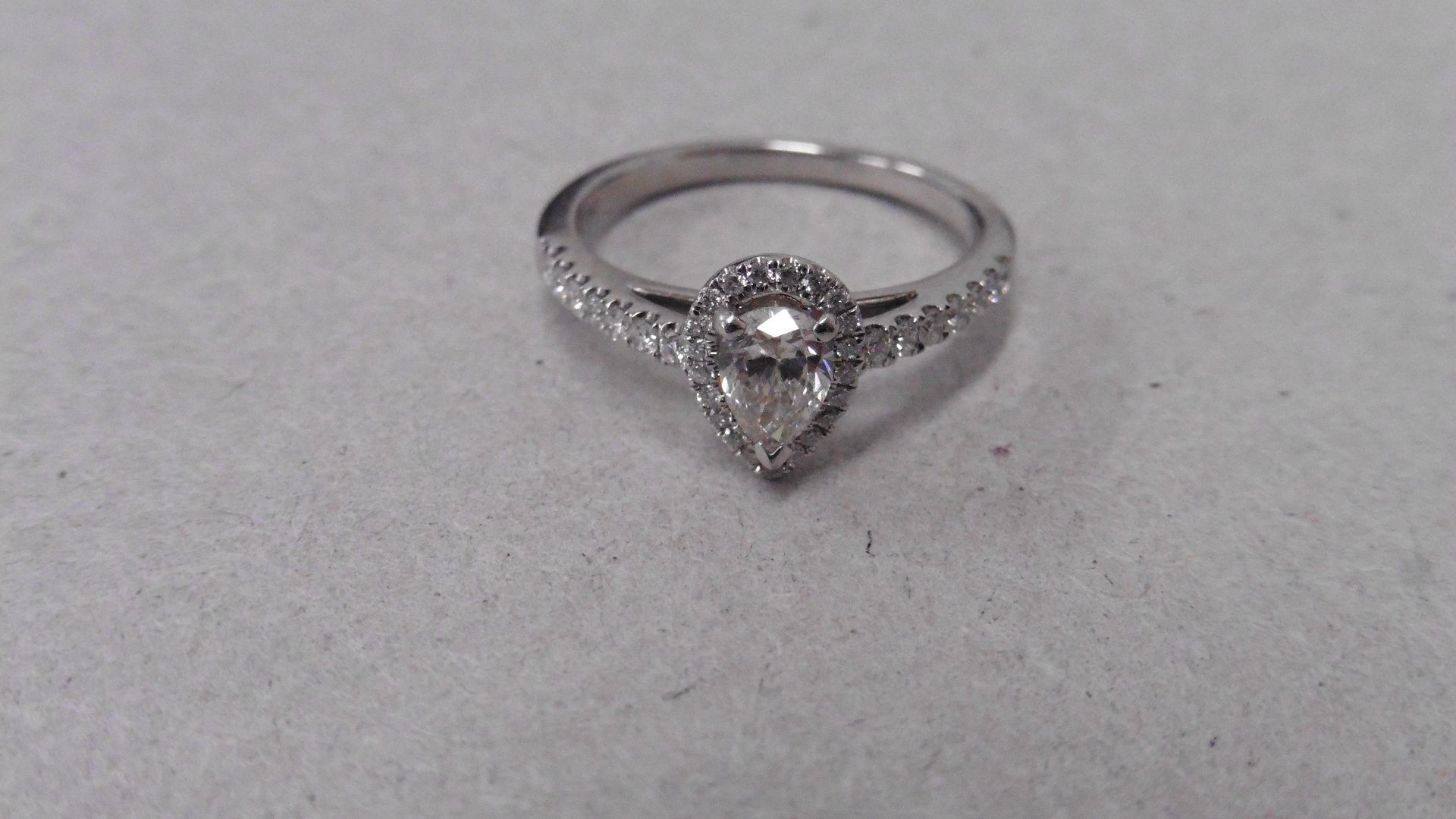 18ct gold diamond set solitaire ring. 0.43ct pear shaped diamond, H colour and VS2 clarity. Halo - Image 7 of 7