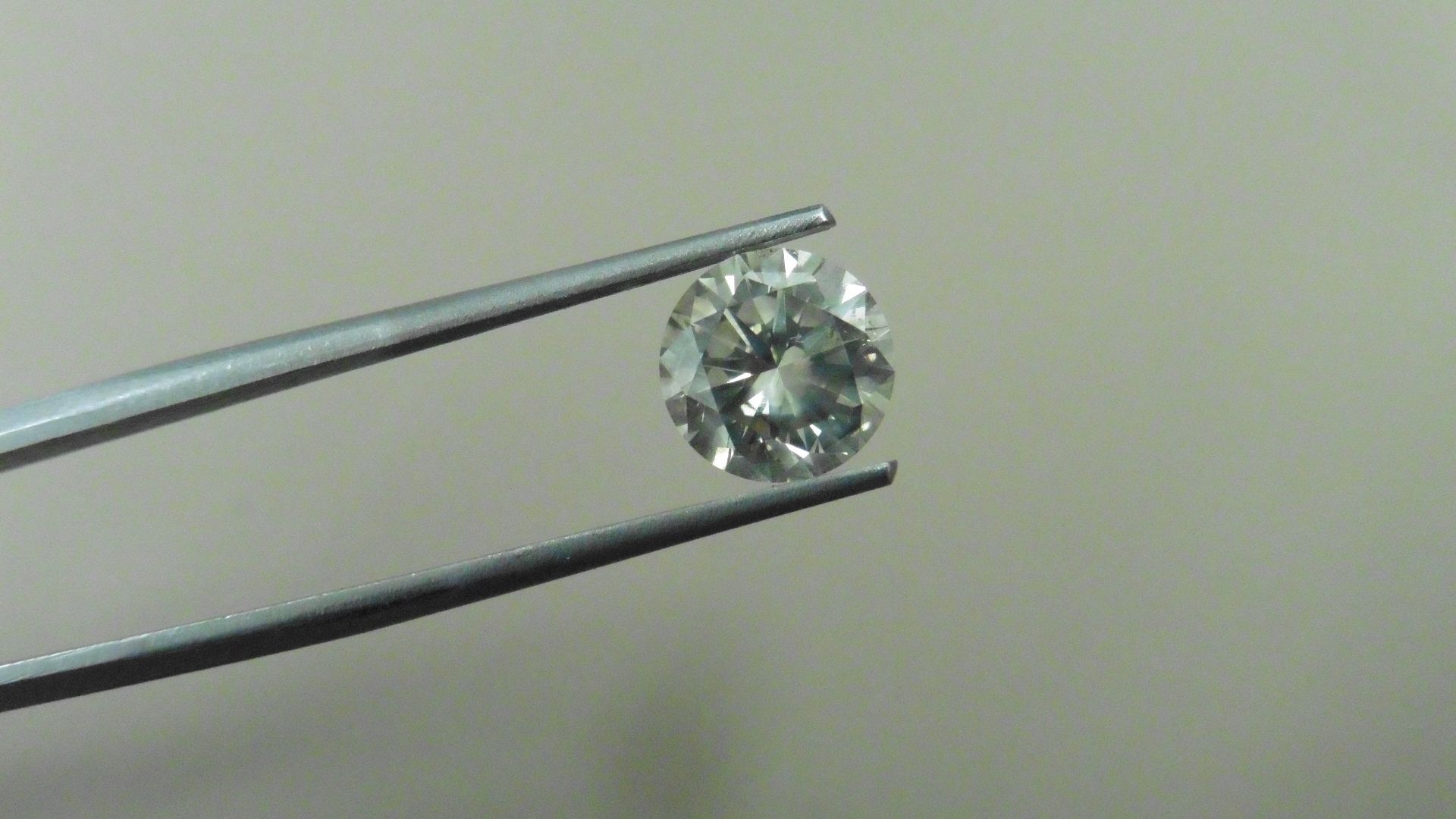 2.08ct natural loose brilliant cut diamond. M colour and si2 clarity. 8.07 x 4.96mm. No
