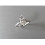 0.70ct diamond solitaire ring set in platinum. Marquise diamond. I colour and si1 clarity. 2 claw