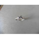 0.70ct diamond solitaire ring set in platinum. I colour, I1 clarity. 4 claw setting with a grooved