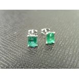 1.40ct stud earrings in platinum 950. 2 rectangular cut emeralds ( treated ) set in a simple 4