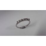 0.50ct diamond five stone ring. Brilliant cut diamonds, I colour and si3 clarity. Claw setting in