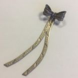 Dainty vintage ribbon bow silver brooch