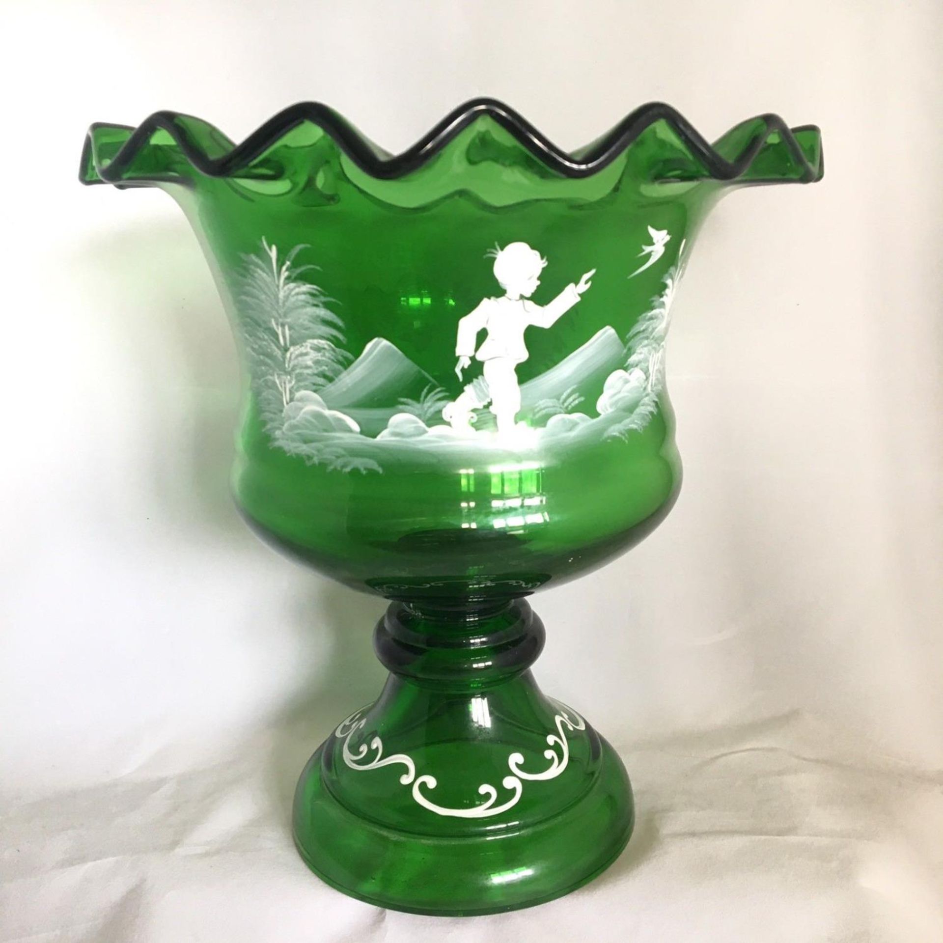 Large Mary Gregory style green glass pedestal vase
