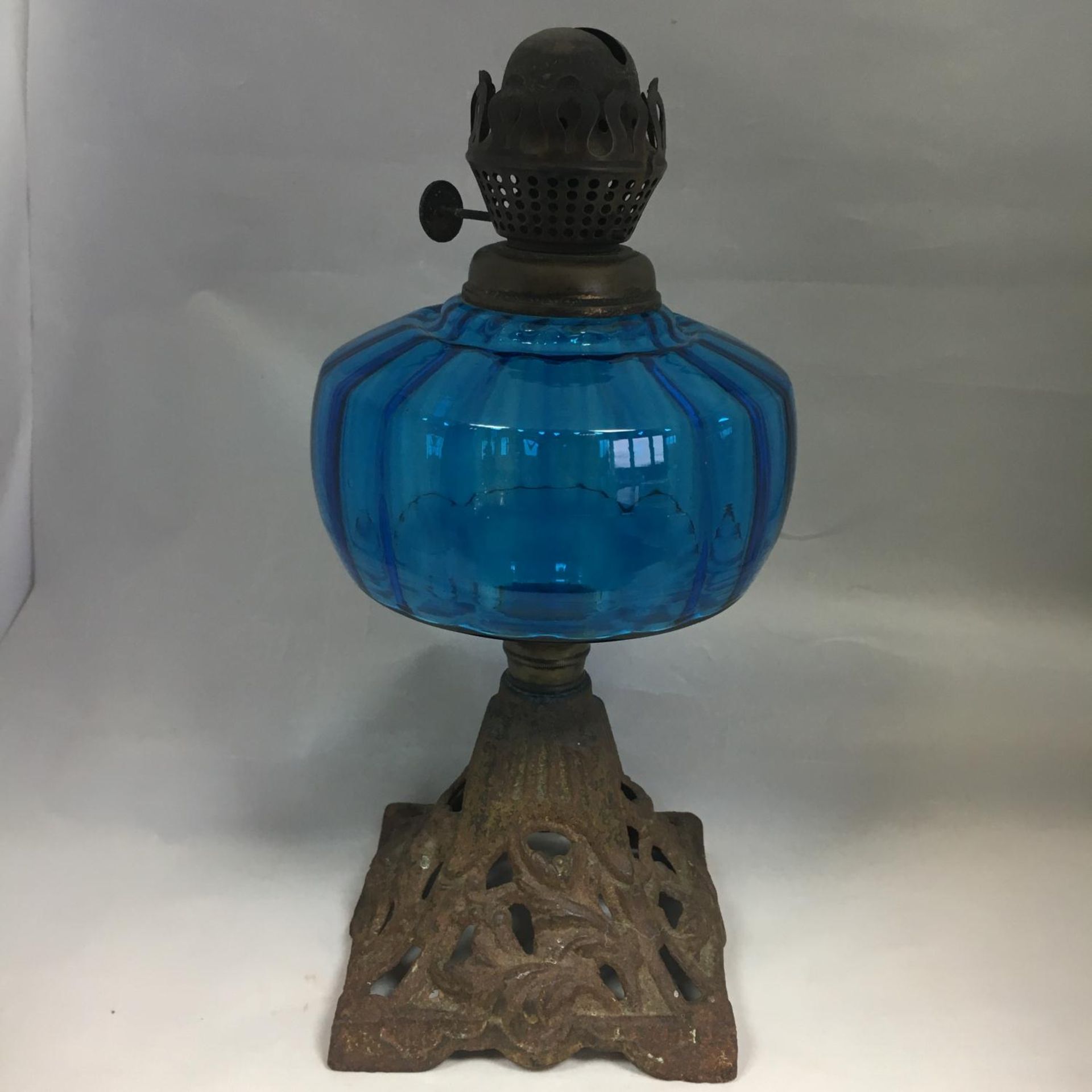 Early 20th Century Single Burner Oil Lamp - Coloured Glass Reservoir Metal Base